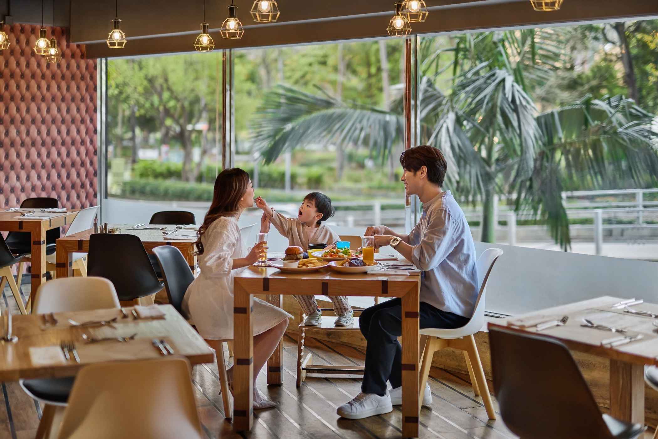 PLAYT Buffet - Family of three having dinner